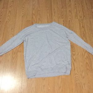 A gray long sleeve shirt